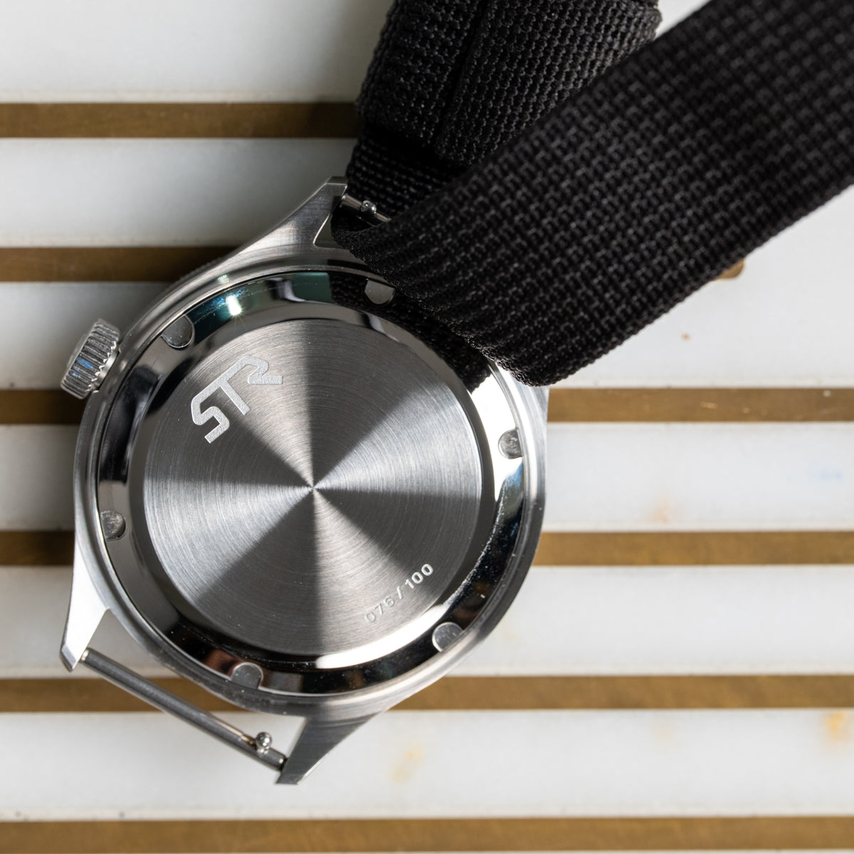 AV86 x STR Kashafa — numbered screw-down caseback | Smiths Boutique