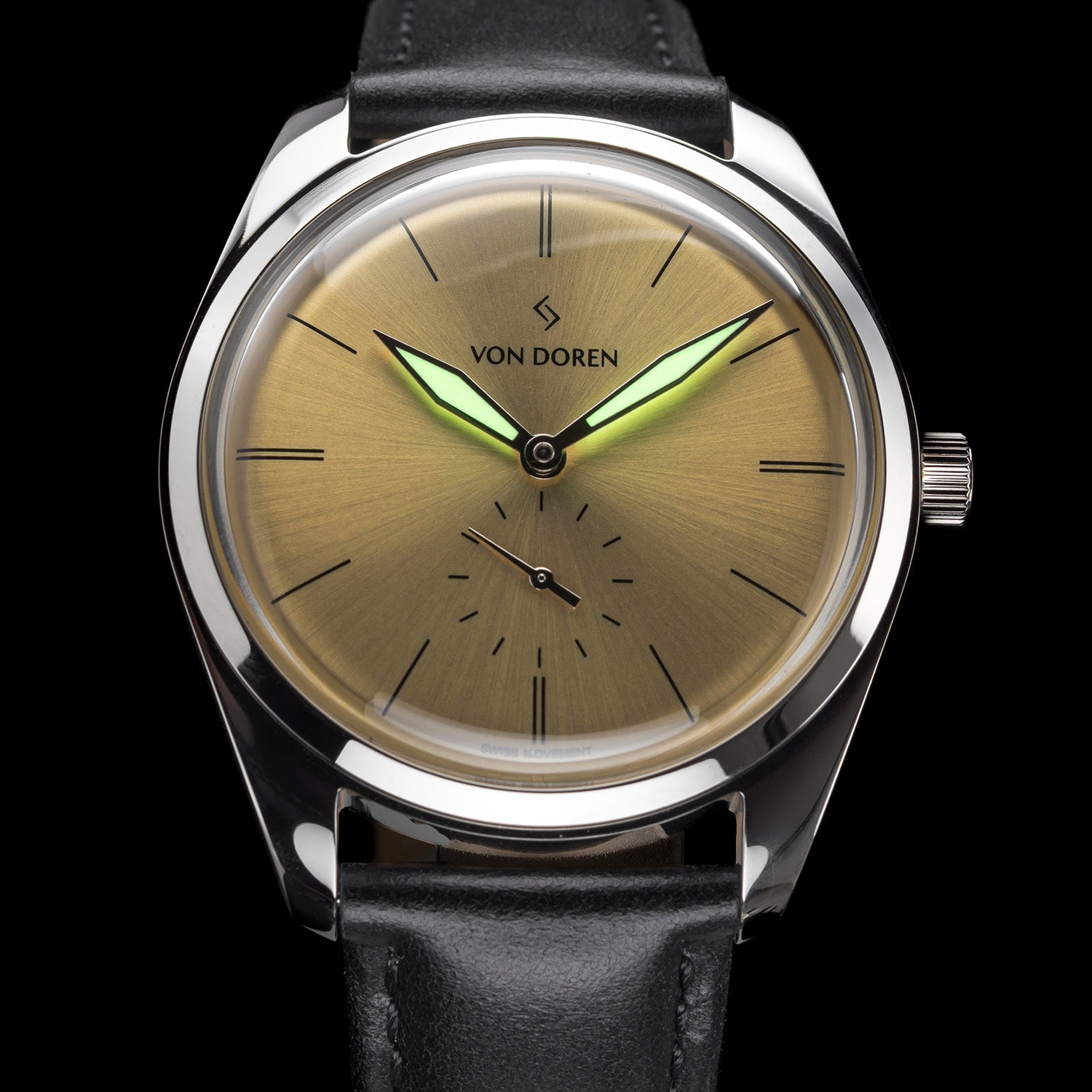 Runde Gold — lume glow on gold dial