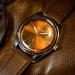 Runde Havana Brown — on brown leather
