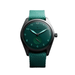 Runde Candy Mint — lume on dial in low light