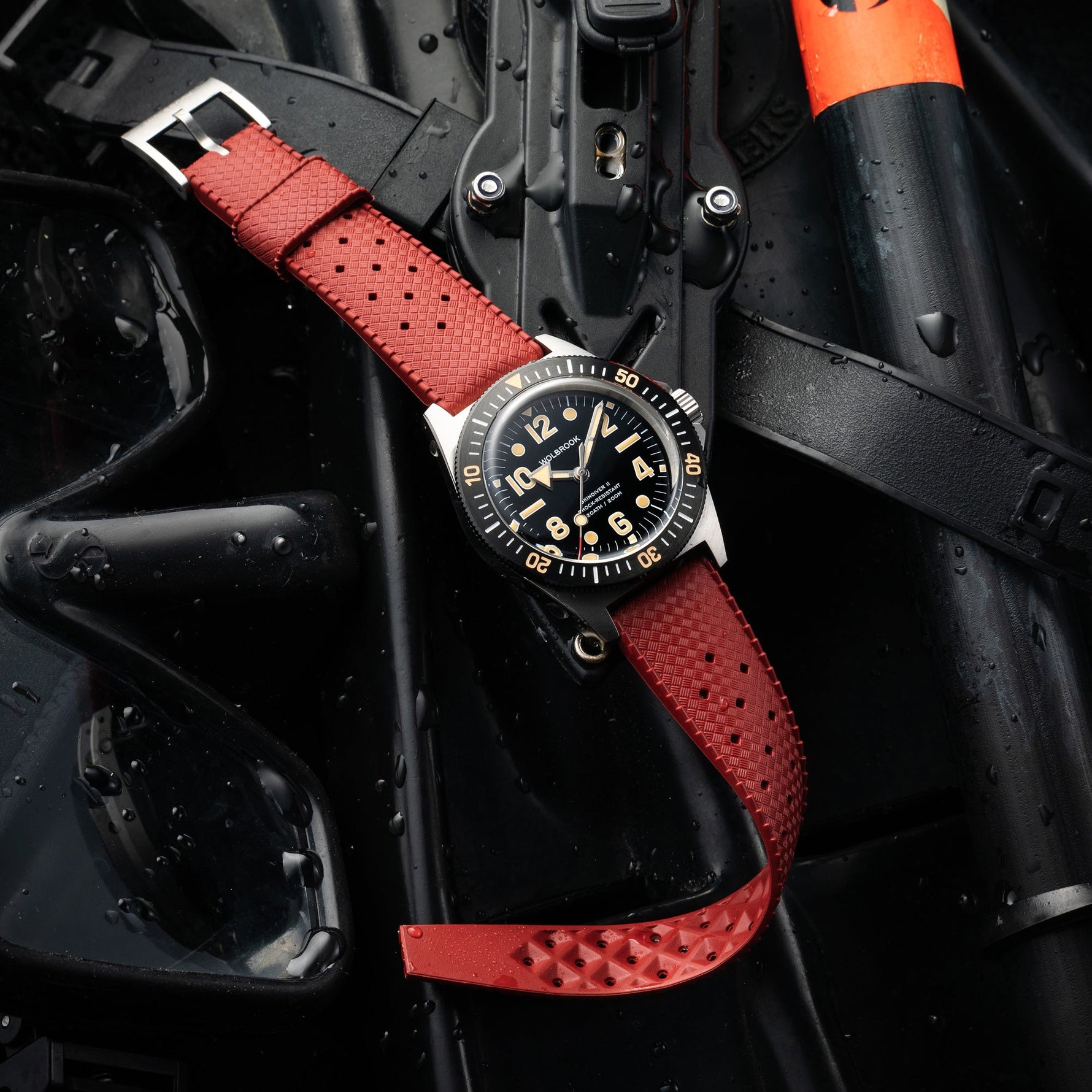 Wolbrook Dark Red Tropic rubber strap fitted to a diving watch