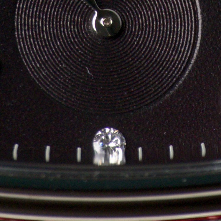 Smiths x AV86 Raqeeqa — close-up of the faceted crystal at six