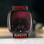 Smiths x AV86 Raqeeqa | رقيقة — burgundy sunray dial darkening to black, applied Eastern Arabic numerals, 33mm polished steel cushion case | Smiths Boutique